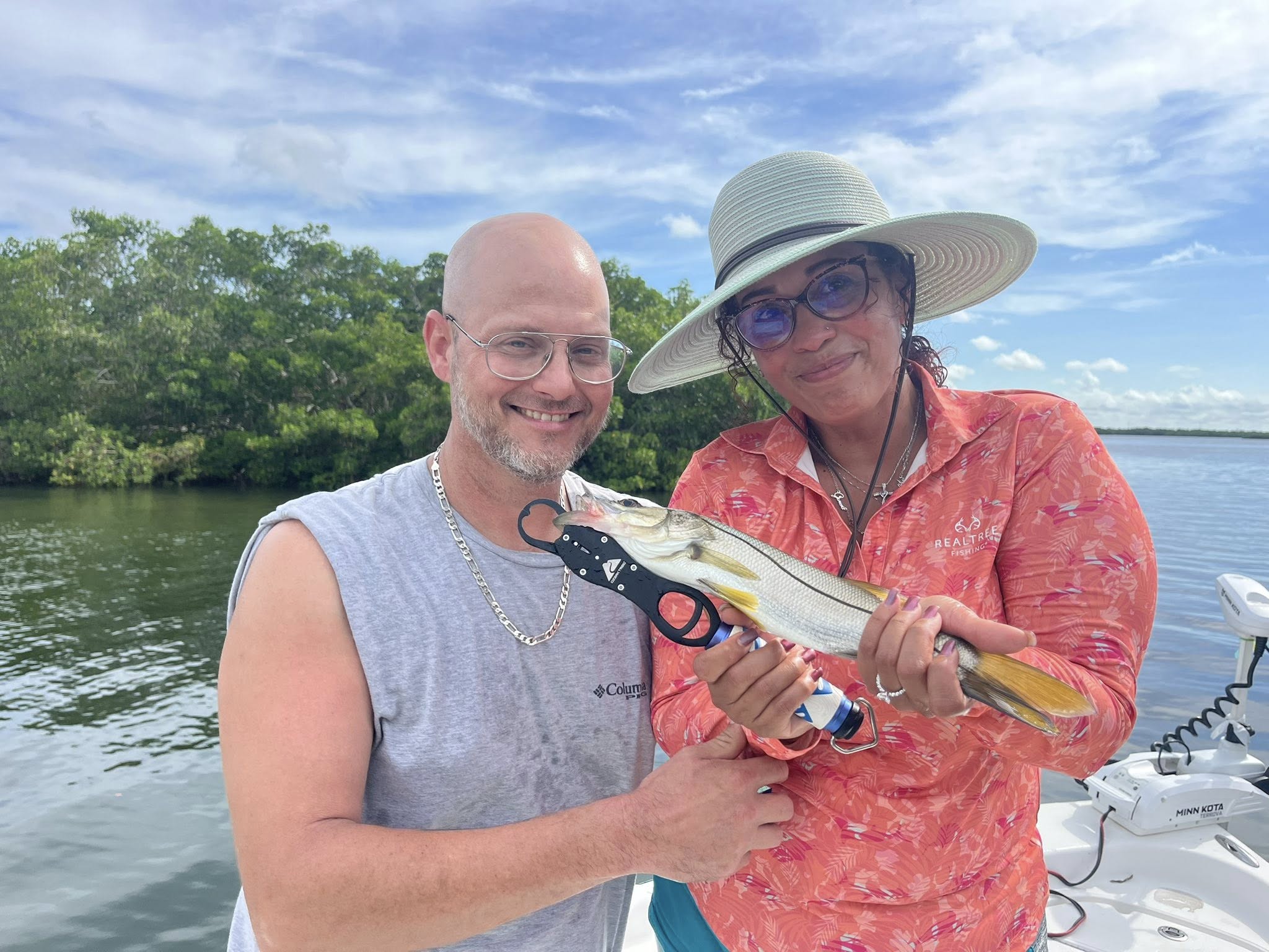 Two people fishing in FL