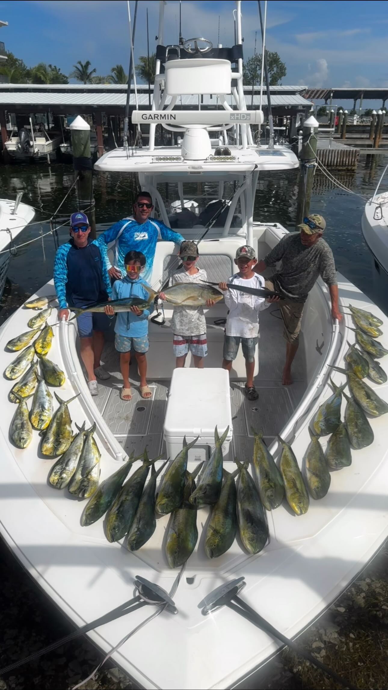 Group of 6 people enjoying fishing tours in Islamorada