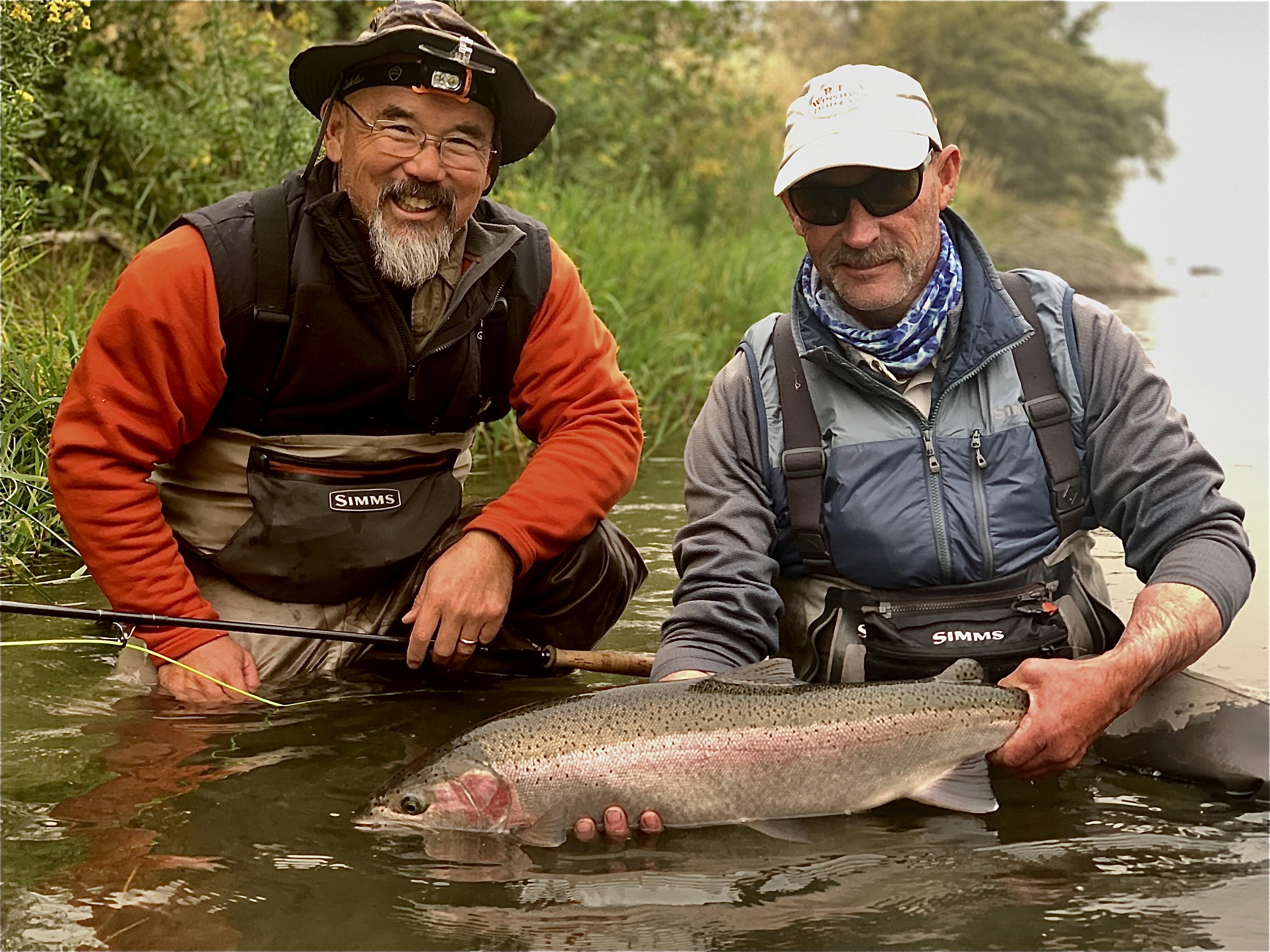 Angler with a 19-inch rainbow trout in Maupin