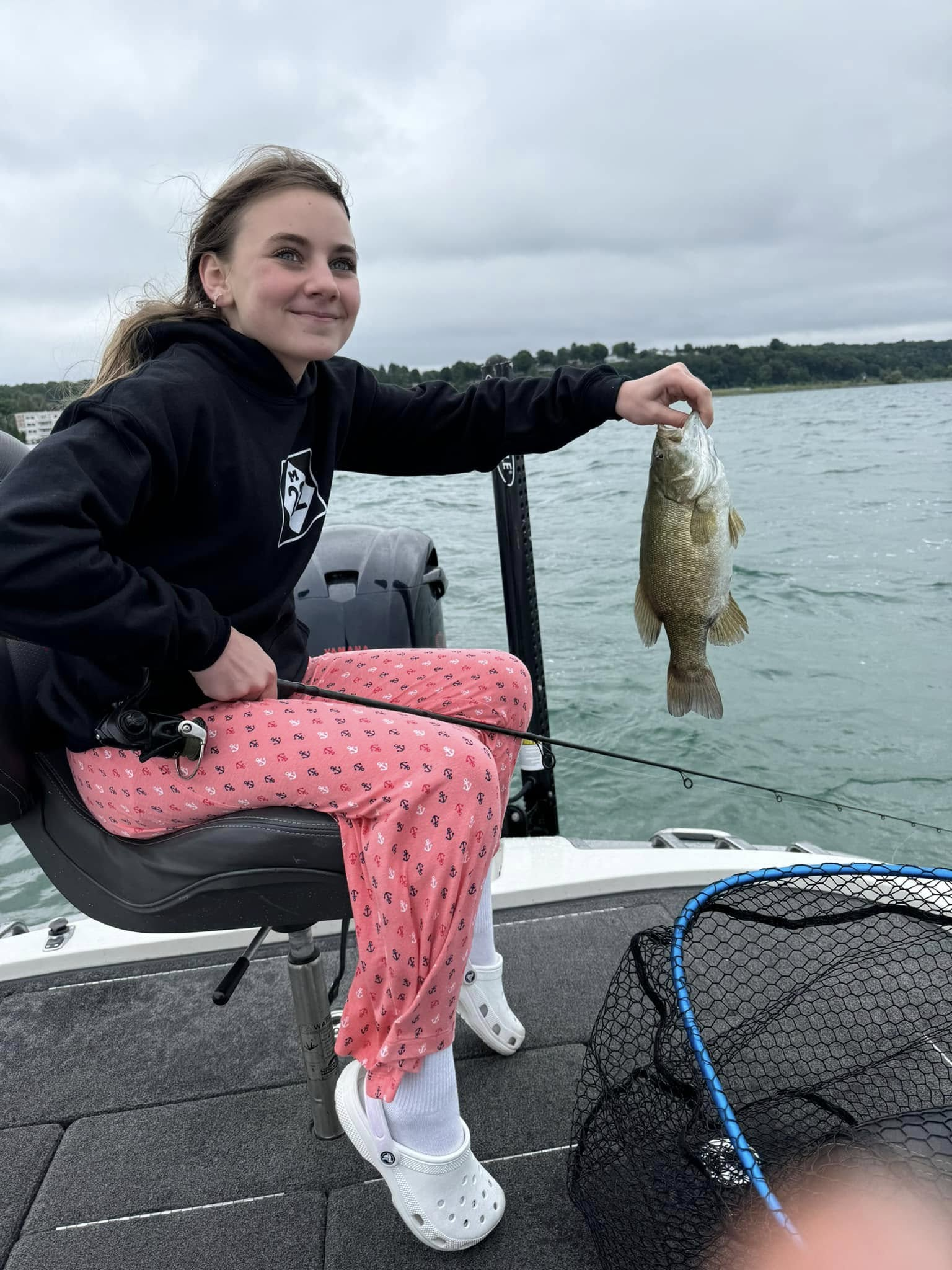 A lone angler fishing in Traverse City