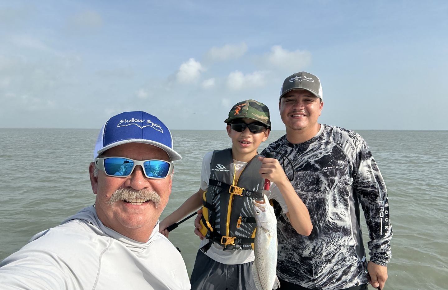 3 people fishing at South Padre Island