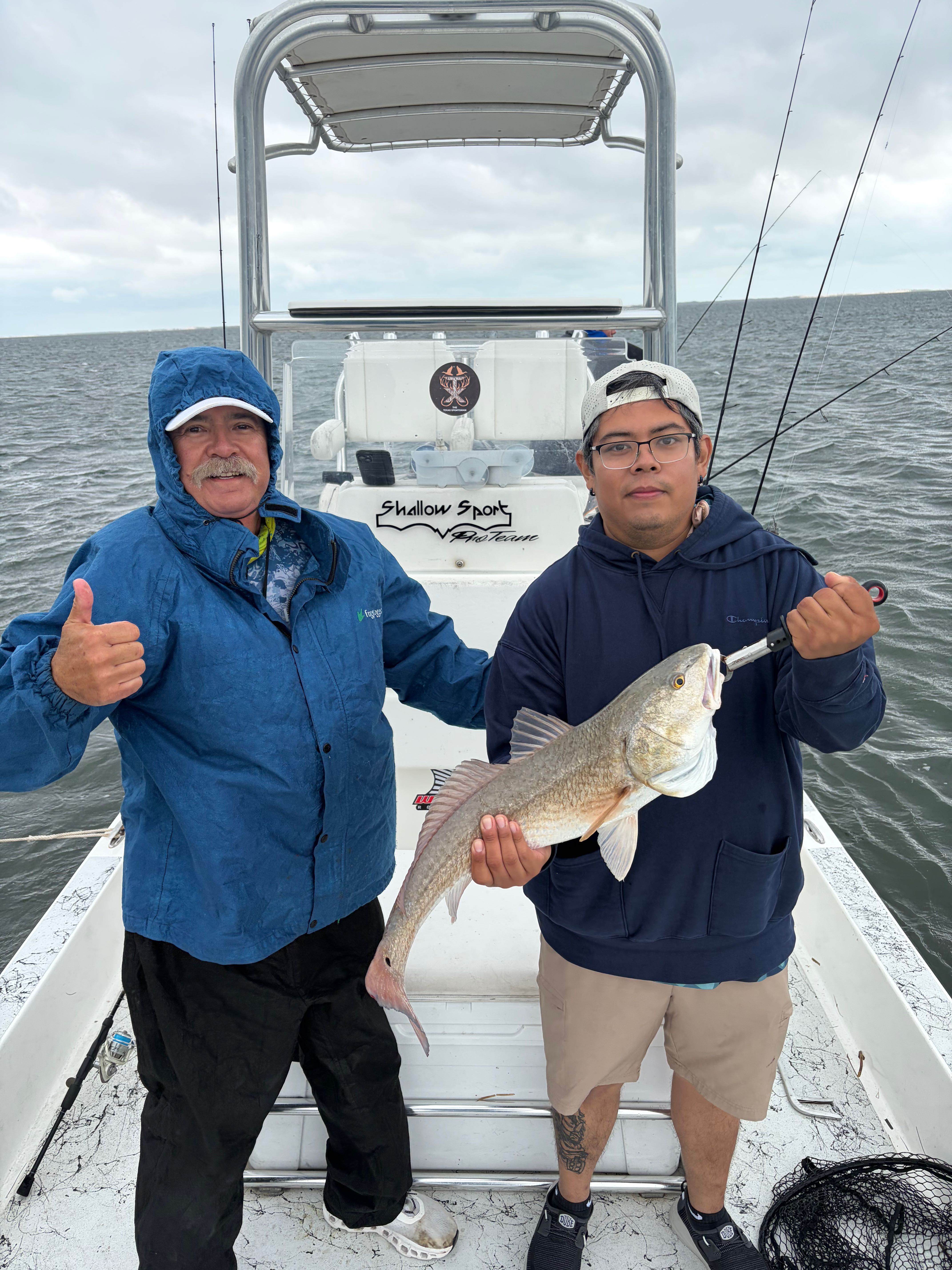 Successful redfish catch on fishing boat in South Padre Island TX waters