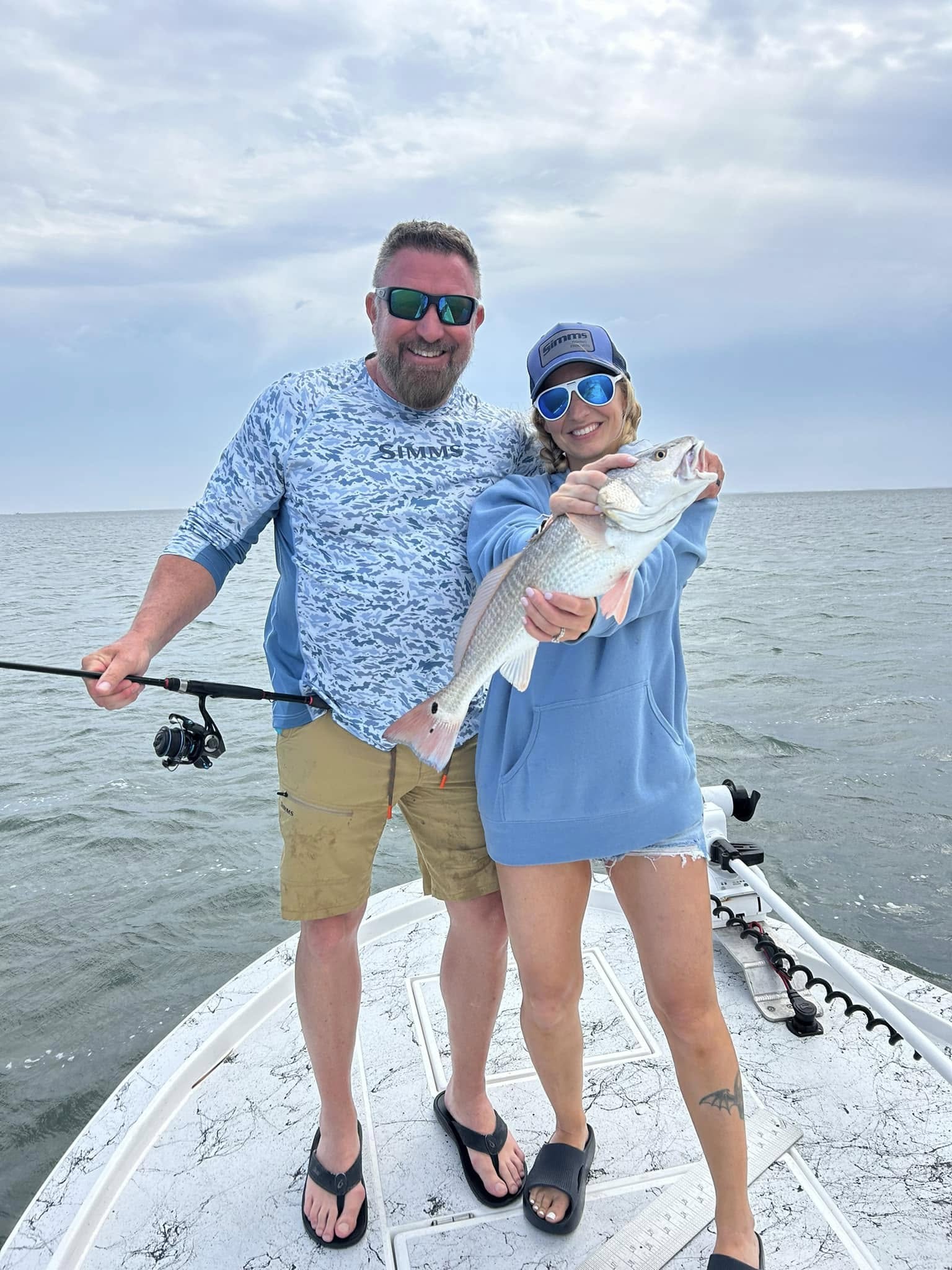South Padre Island morning inshore fishing charter boat targeting redfish and trout in Texas bay