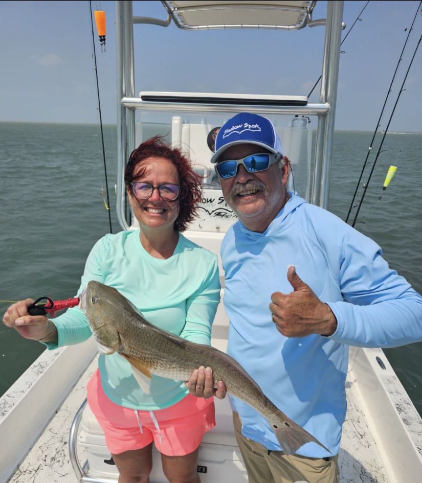 South Padre Island afternoon inshore fishing charter boat targeting redfish and trout in bay waters