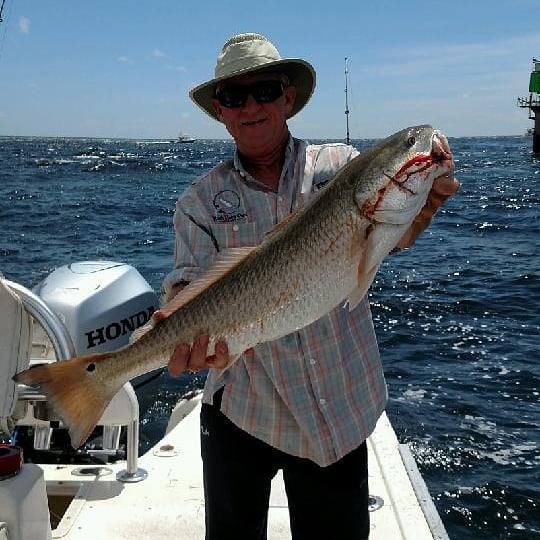 Angler with a 27-inch fish at Fort Walton Beach
