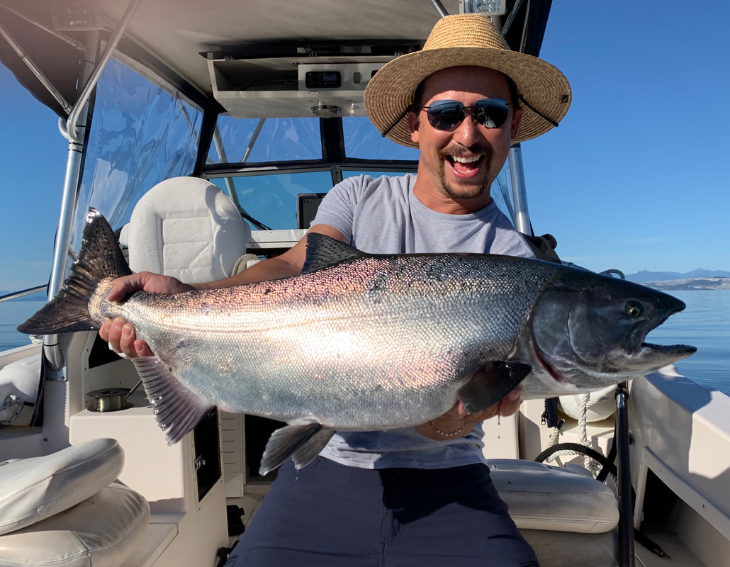 Catching a mighty lake trout in Comox