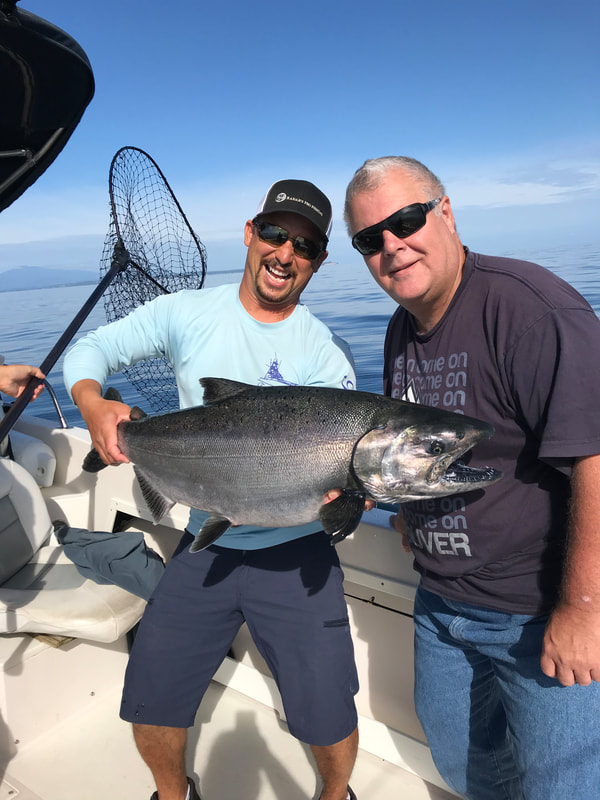 Coho salmon, 23 inches, fishing in BC