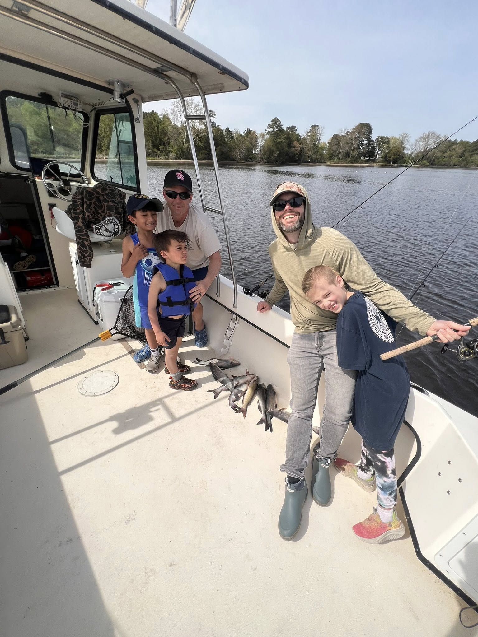Group of 5 people enjoying fishing and cruises in MD