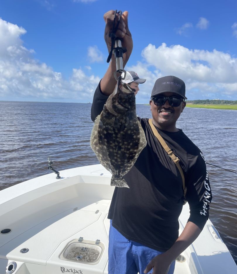 Southern flounder caught fishing on boat in Oak Island NC waters