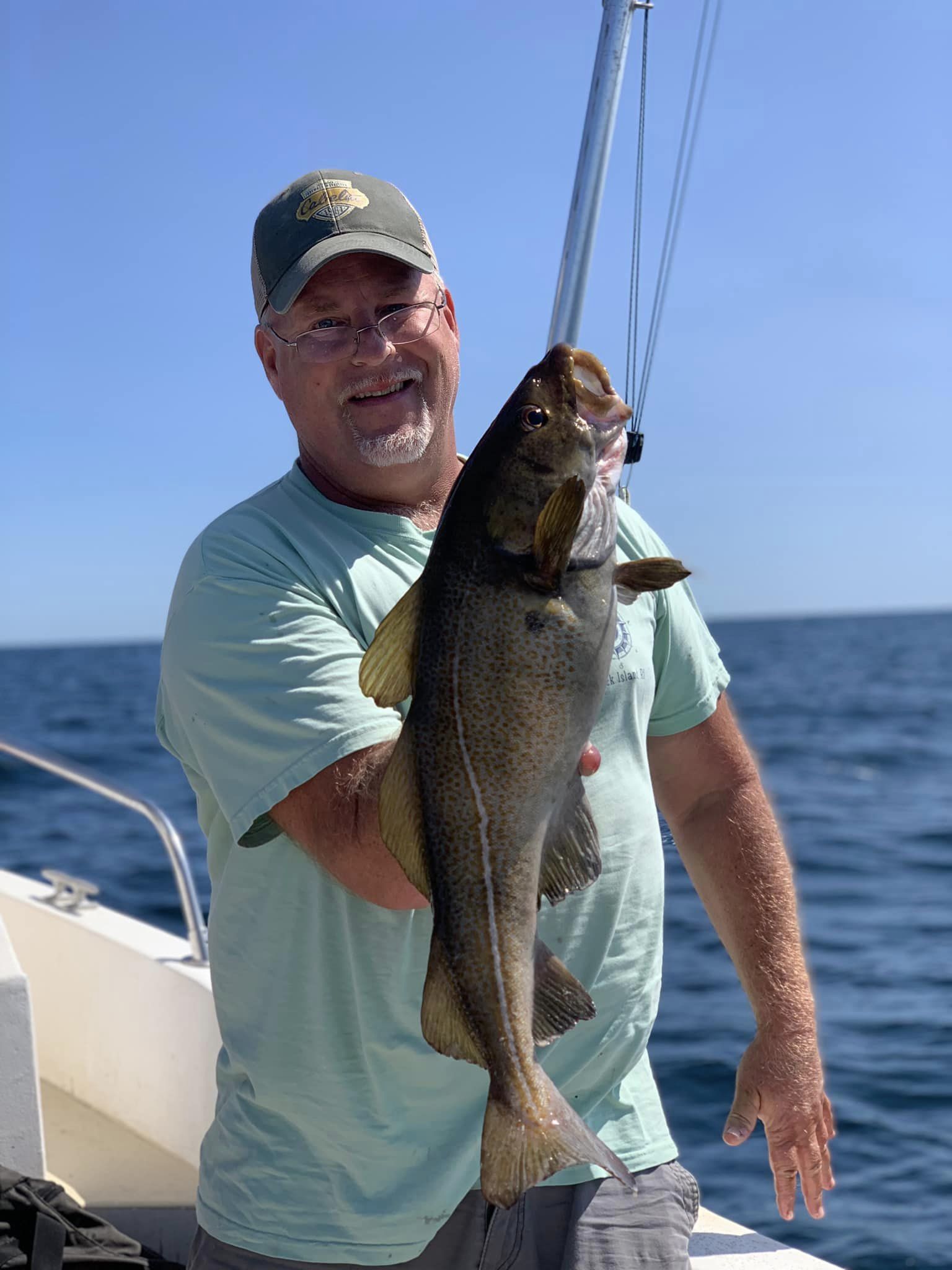 Lone angler fishing in Groton