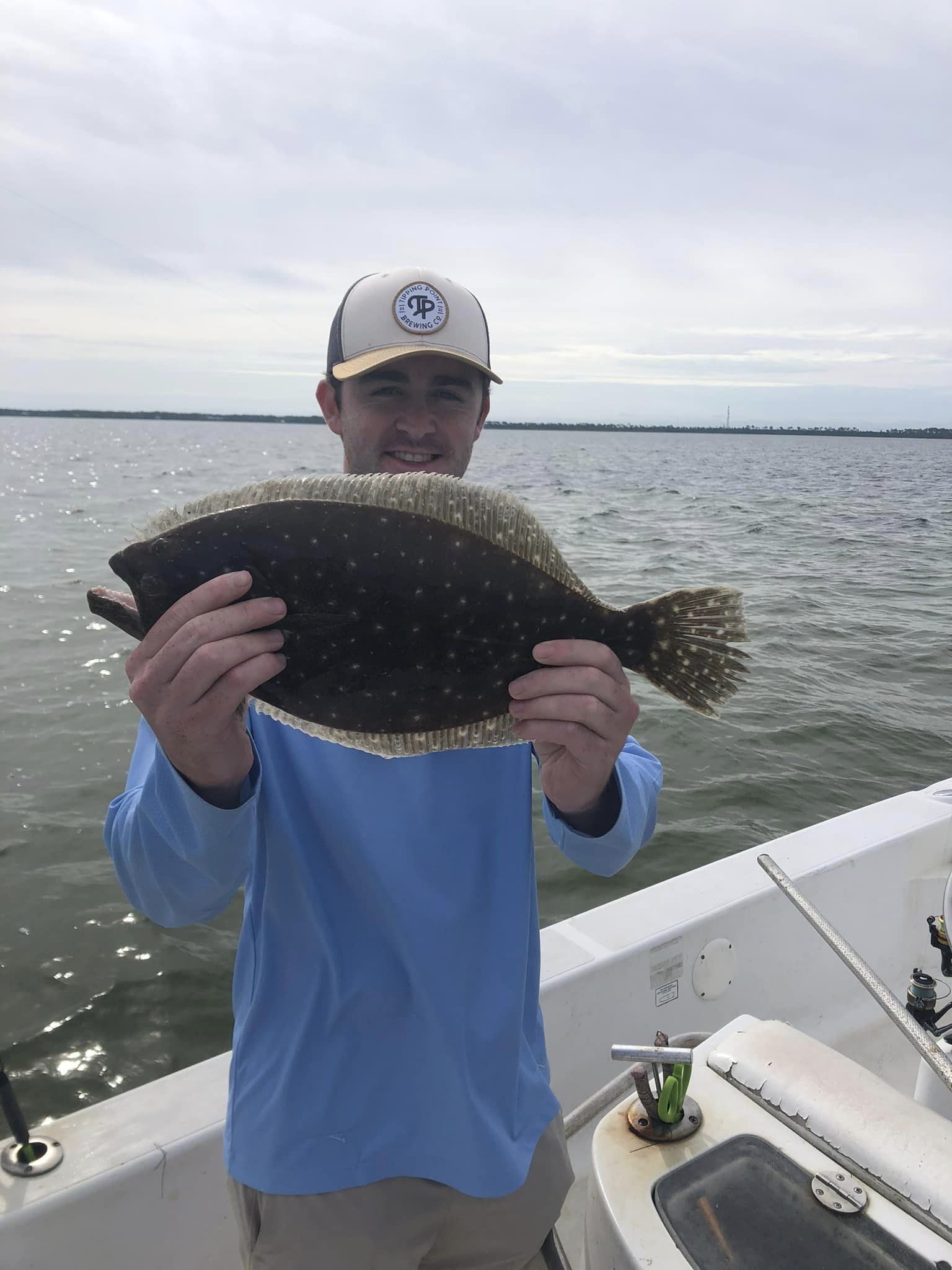Catching a Southern Flounder fish in FL