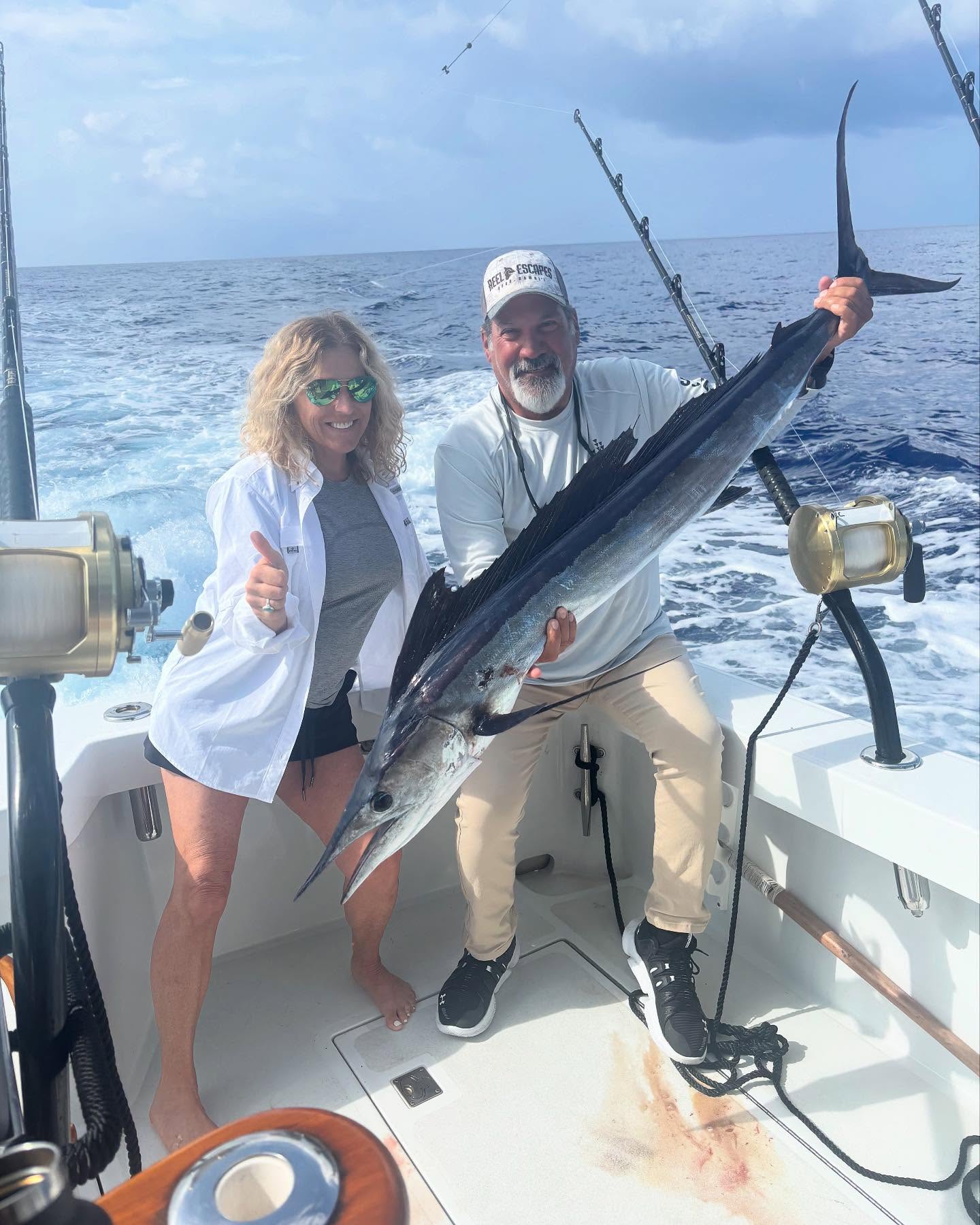 Two people fishing in HI