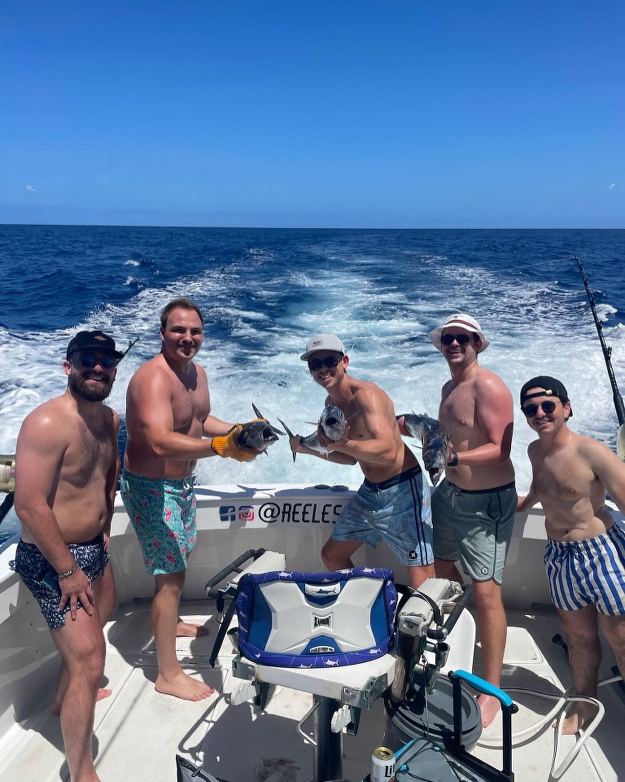Five people enjoying a fishing trip in Kailua-Kona