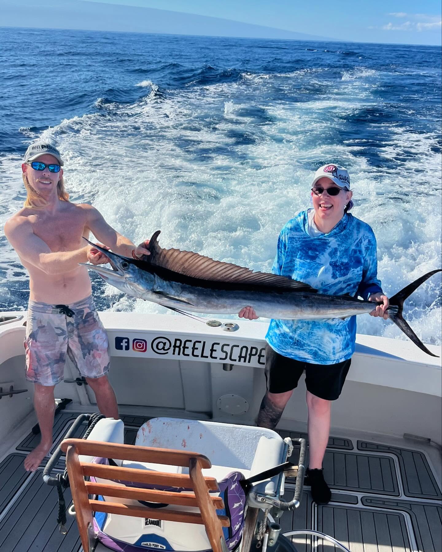 Kona offshore fishing charter boat on Pacific waters targeting pelagic fish species