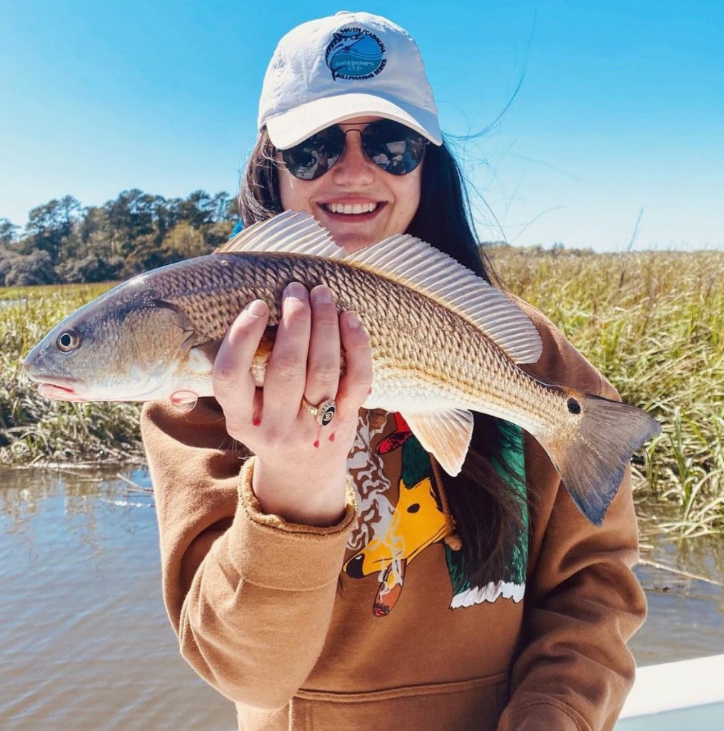 Angler fishing with redfish catch in South Carolina