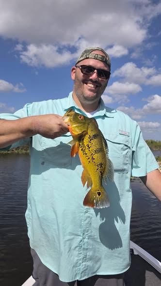 Peacock bass catch displayed on fishing boat in Fort Lauderdale FL