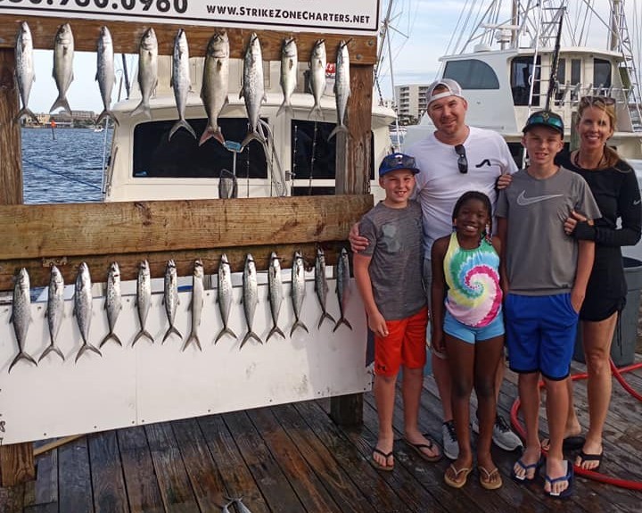 A group of 10 little tunny and cero mackerel fish caught in Destin