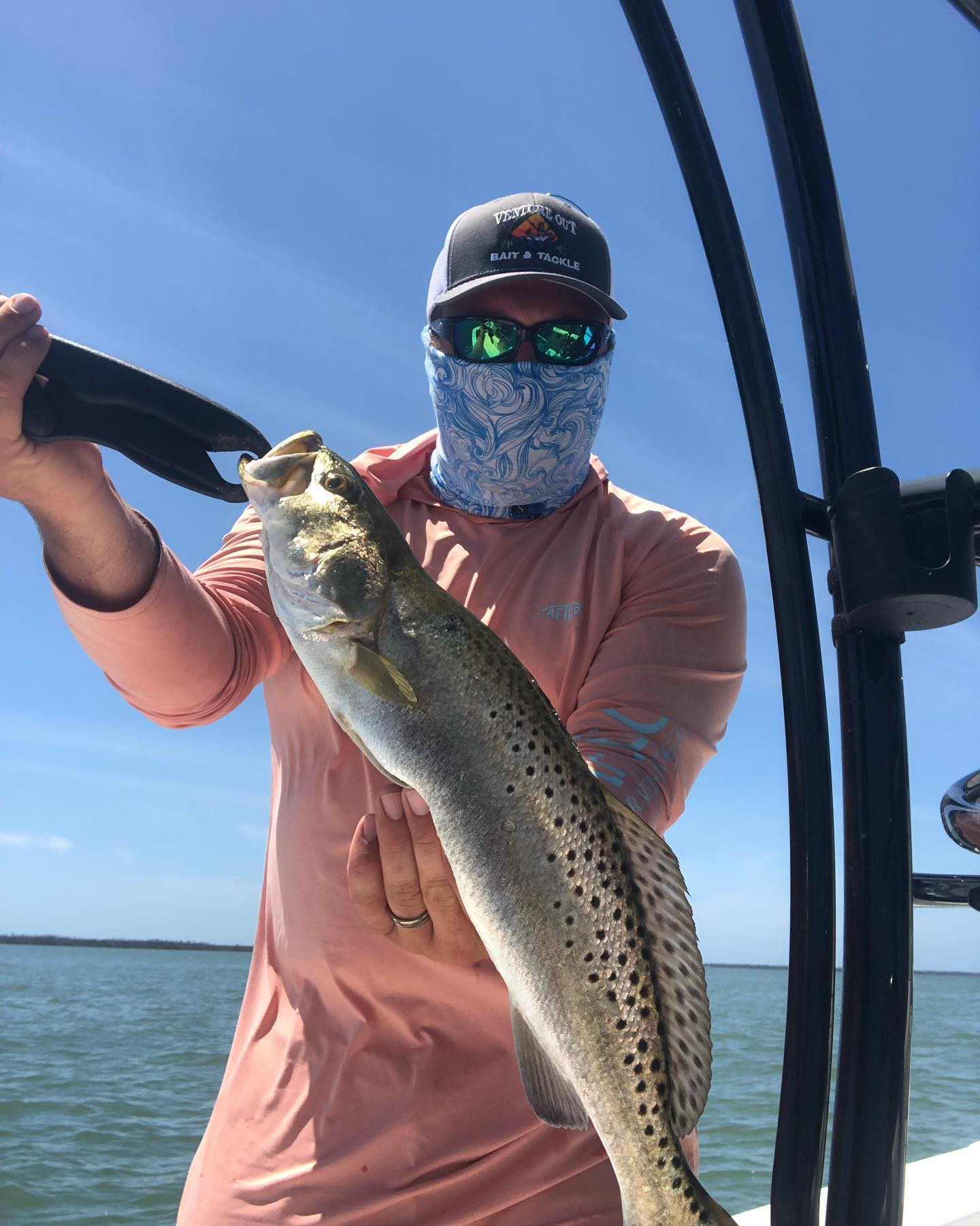 A person fishing in the waters of Murrells Inlet