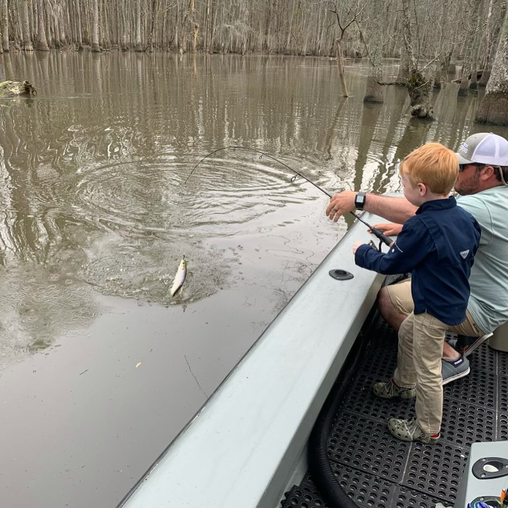 Two people enjoying outdoor activities in Manteo