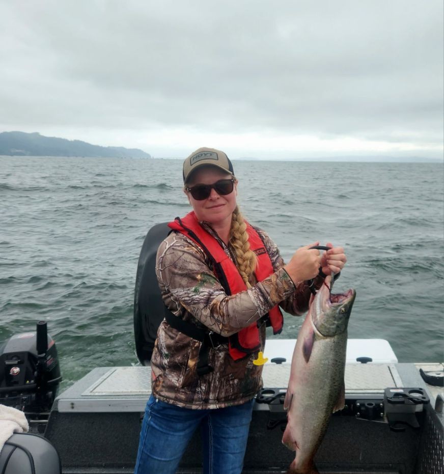 A person fishing for coho salmon in Portland
