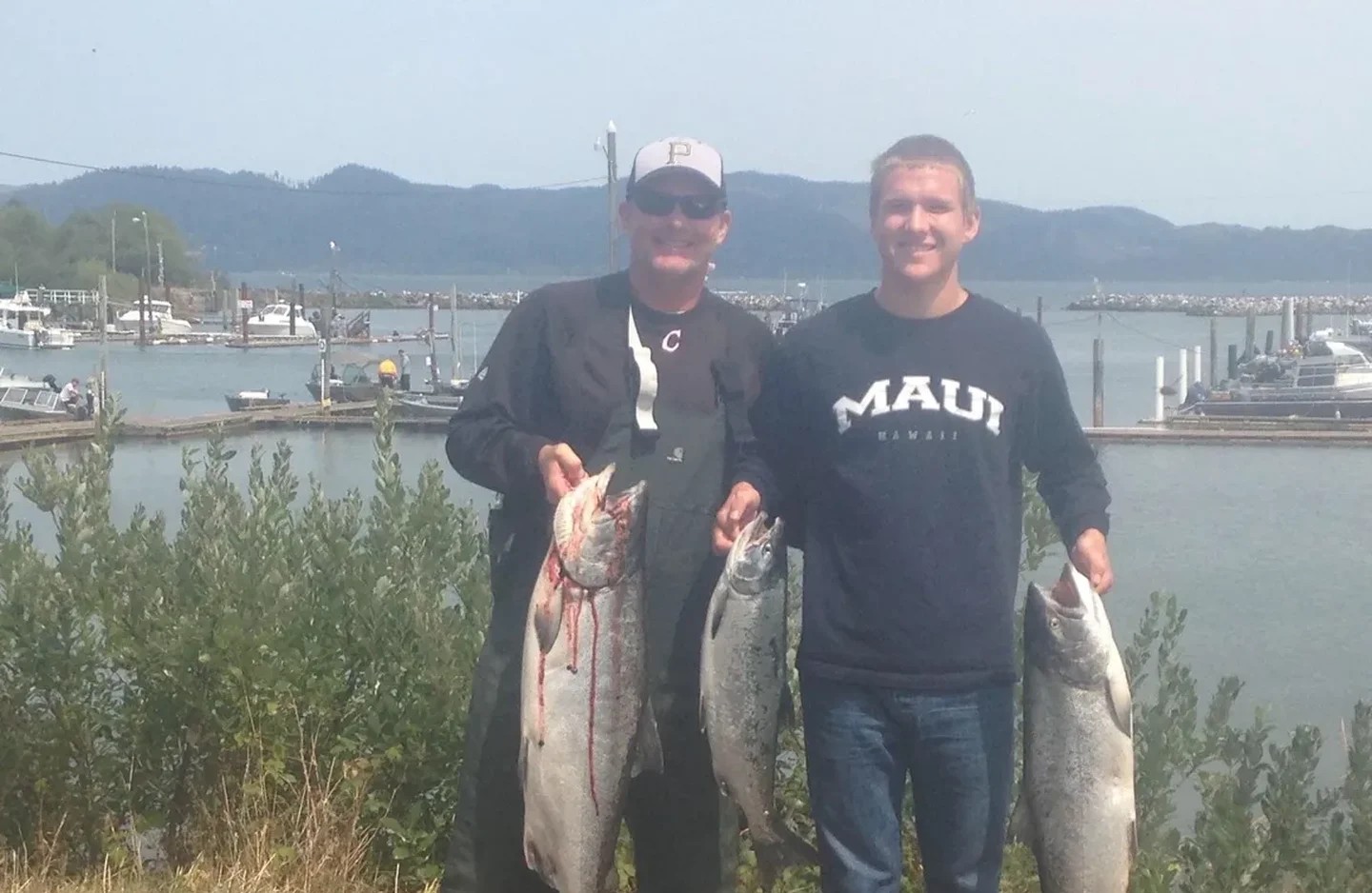 Coho salmon and rainbow trout caught while fishing in OR