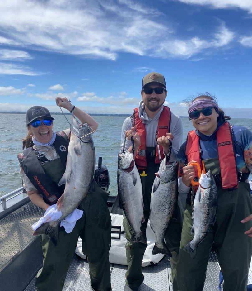Portland Chinook salmon fishing charter boat on Columbia River near Oregon with guided trolling