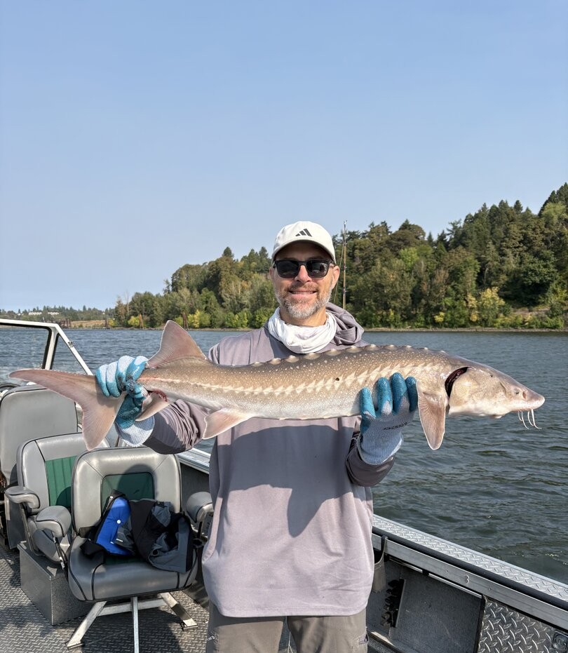 Private sturgeon fishing charter boat on Columbia River near Portland Oregon
