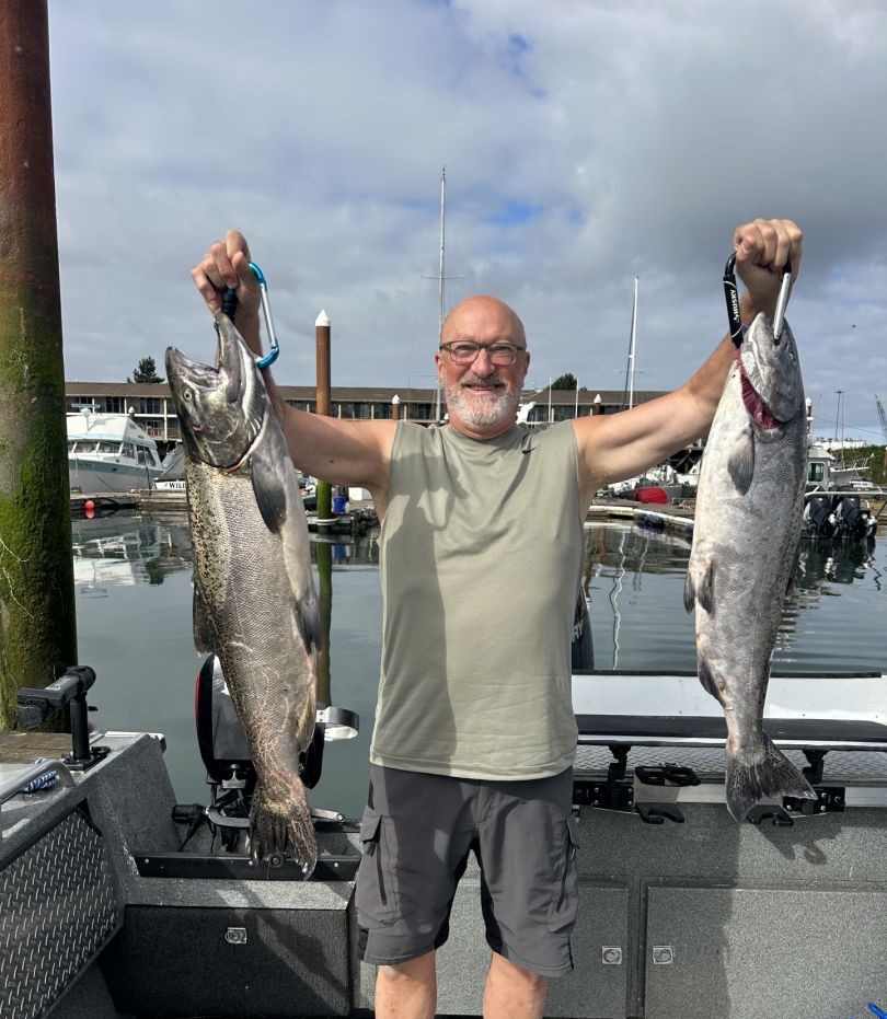 Solo angler fishing for Chinook salmon on Columbia River near Portland Oregon