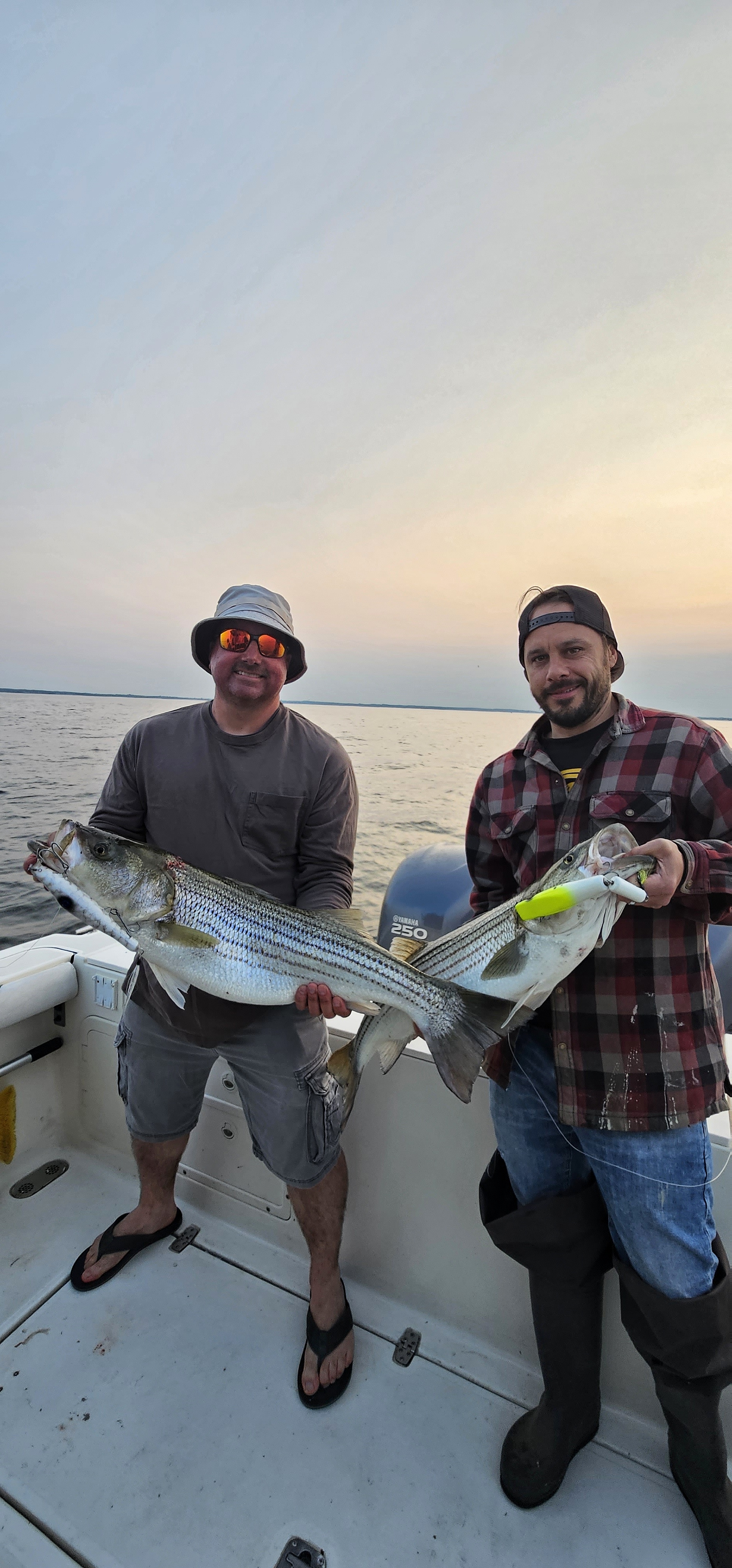 A striped bass caught by two people in Port Monmouth