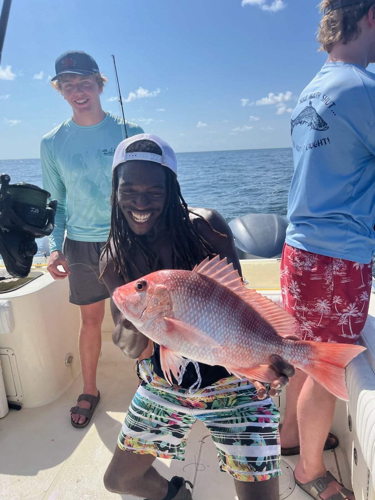 Red snapper caught fishing in Pensacola FL waters displayed on boat deck