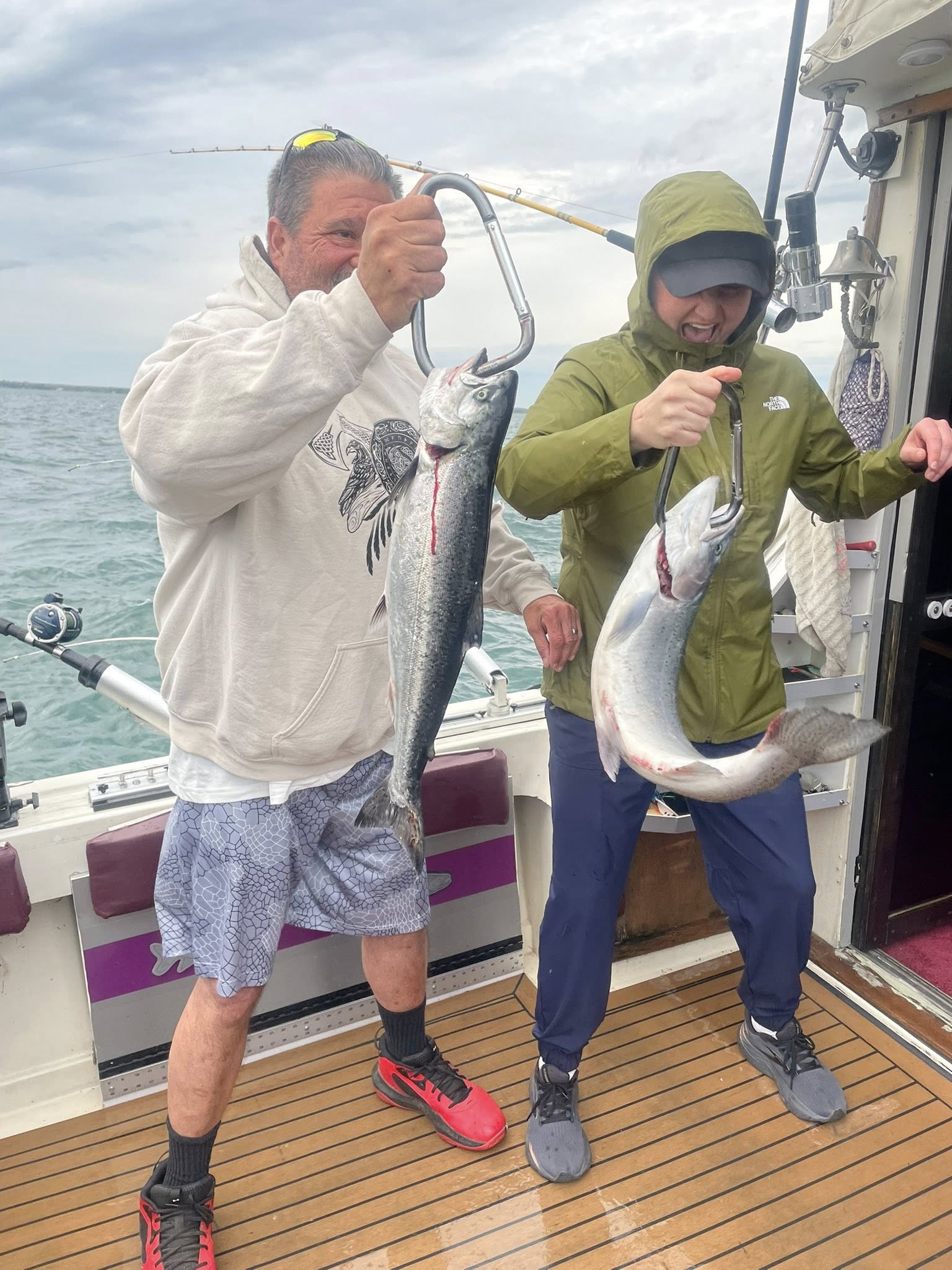 Two large Chinook salmon caught on fishing charter boat in Olcott NY