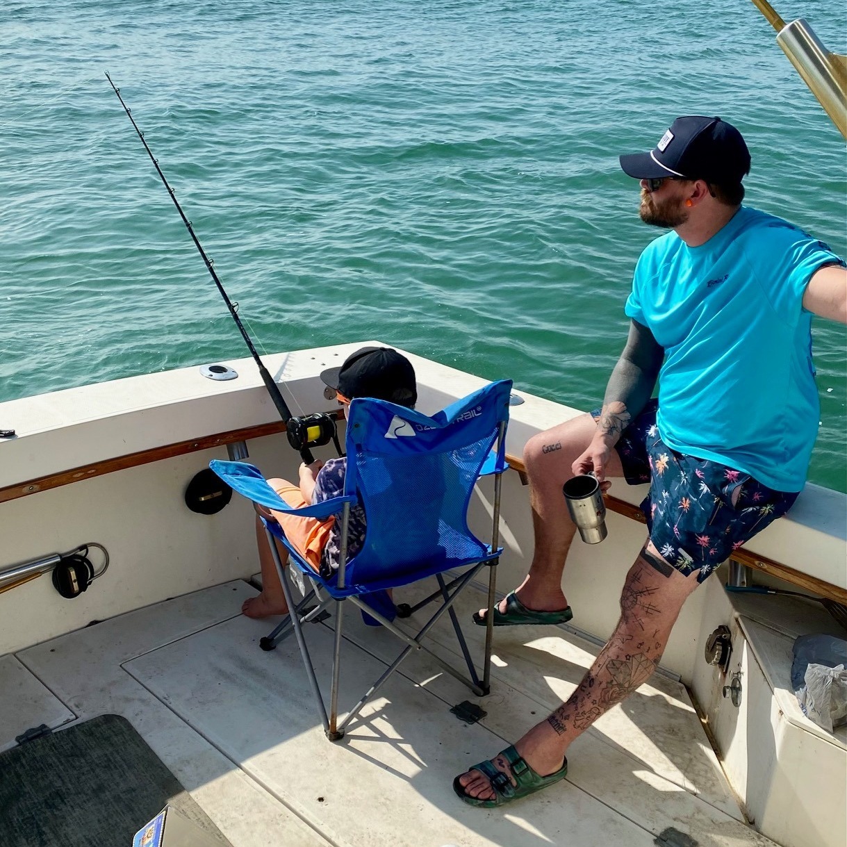 Angler stands tall in Port Aransas, Texas enjoying a day of fishing