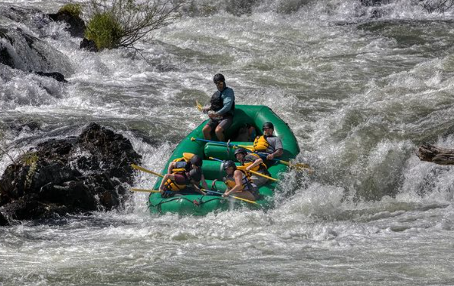 Four people enjoying water sports in Grants Pass