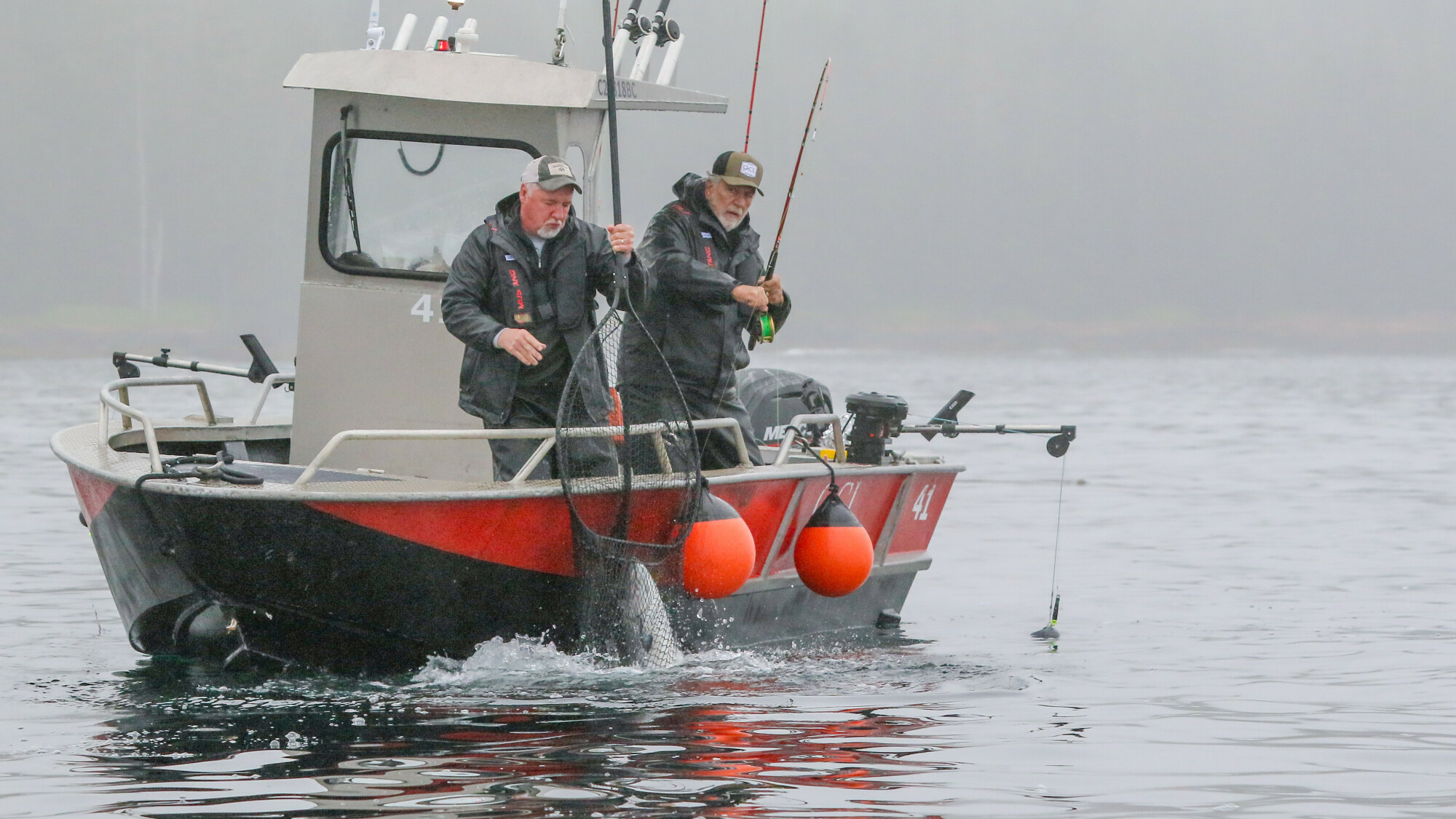 Two people fishing in BC
