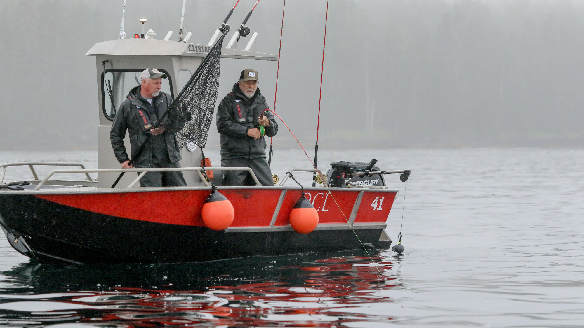 Two people fishing in BC