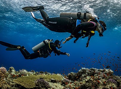 Scuba diver practicing skills in pool during ReActivate refresher course West Palm Beach
