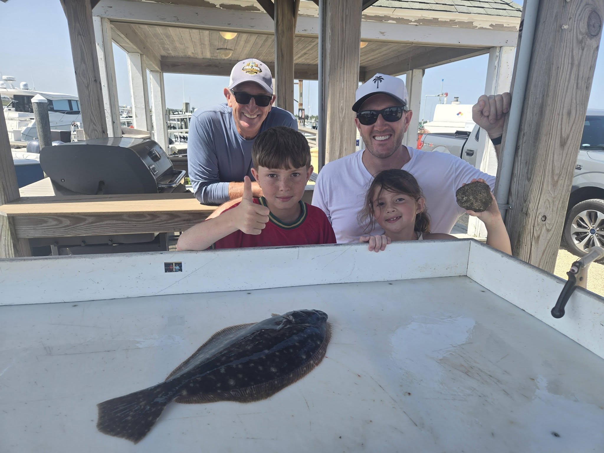 Summer flounder catch displayed on fishing boat deck in Avalon NJ