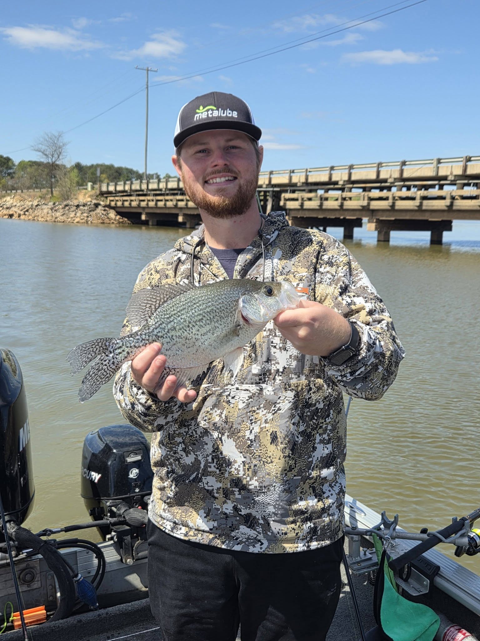 Freshly caught crappie displayed on fishing boat near bridge in Lyman SC