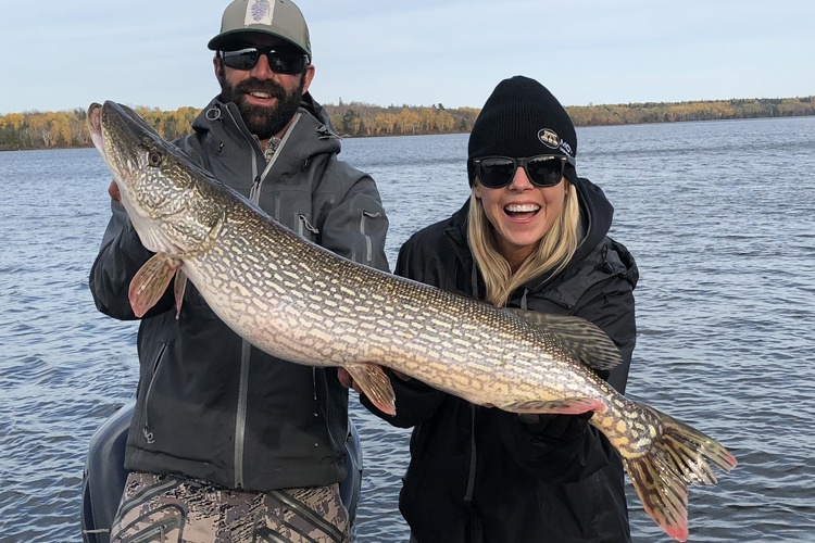 Two people with a 34-inch fish in MN