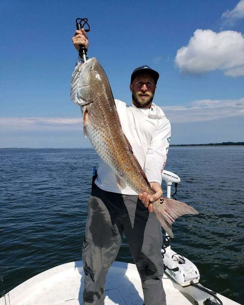 A fisherman with a big 27-inch catch in Florida