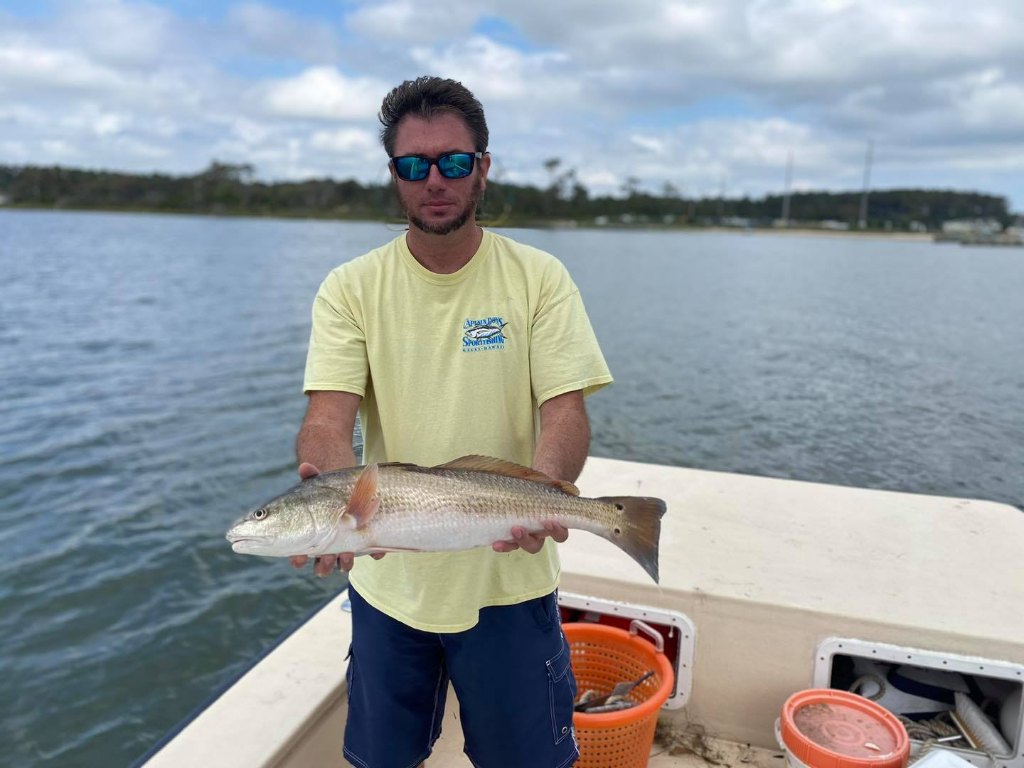 Angler holding a 21-inch fish in North Carolina