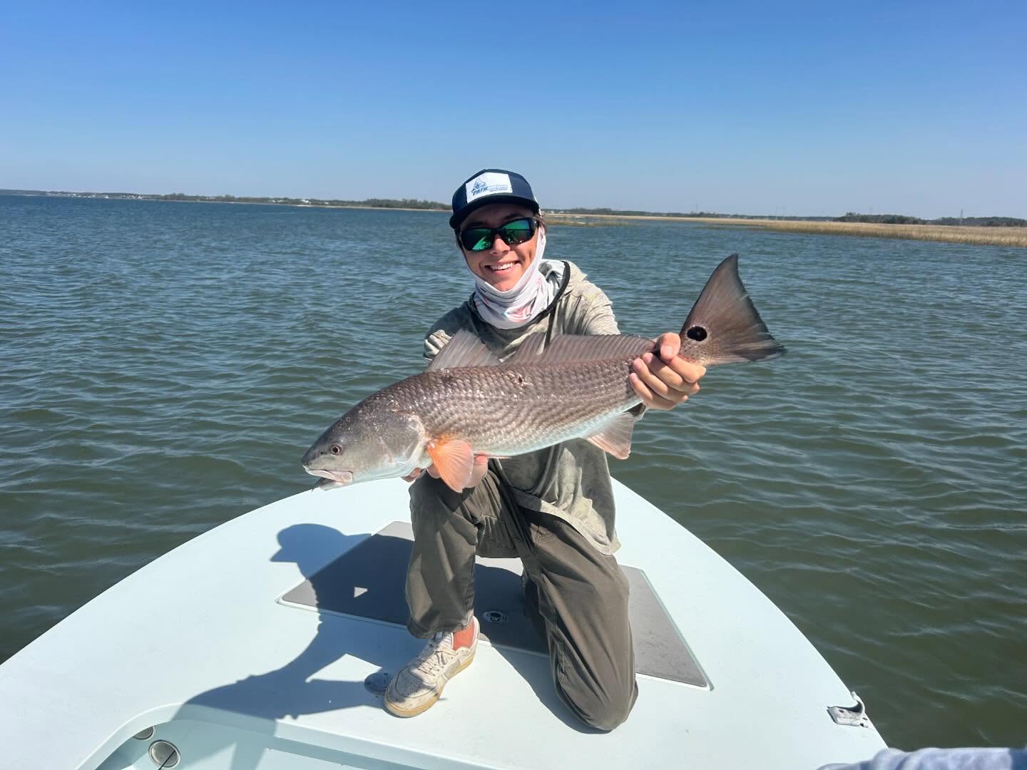 Angler with a large redfish catch in SC