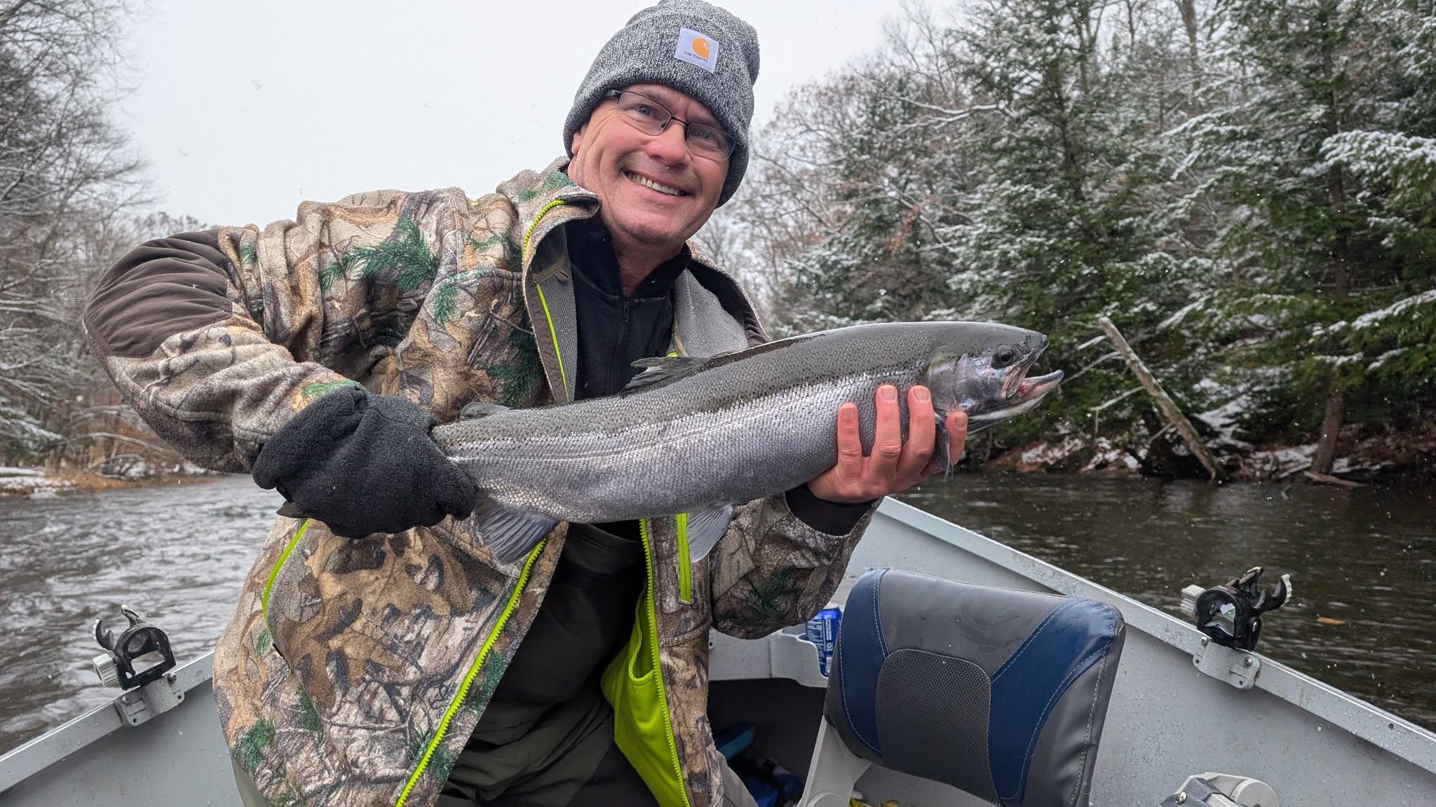 A person fishing for a bull trout in NY