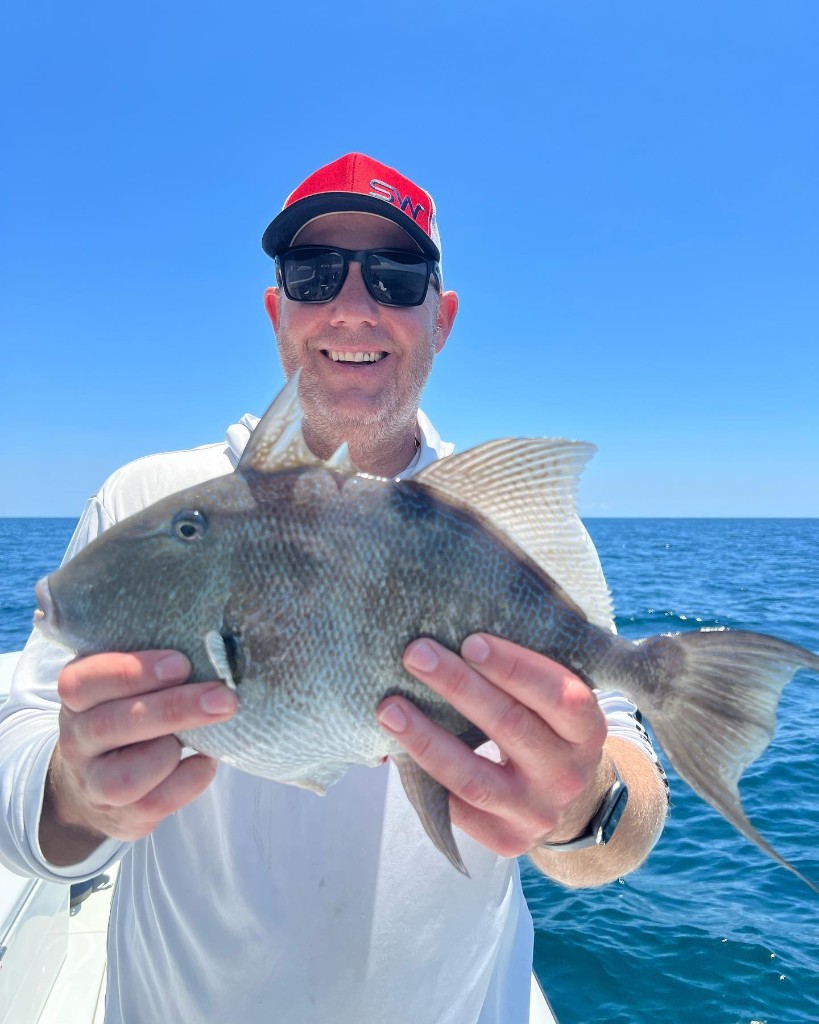 A person fishing in Panama City Beach