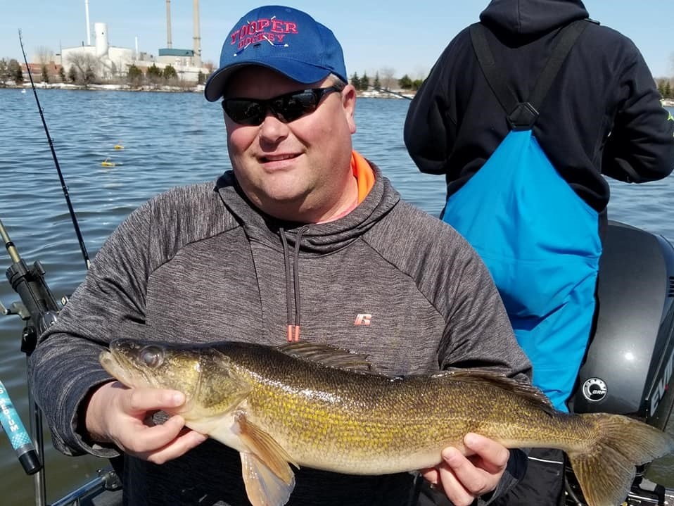 1 fisherman with a big 21-inch catch in Green Bay