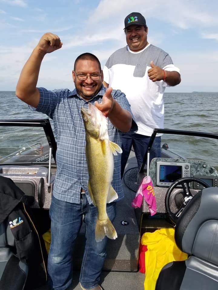 A photo of two people fishing in Wisconsin