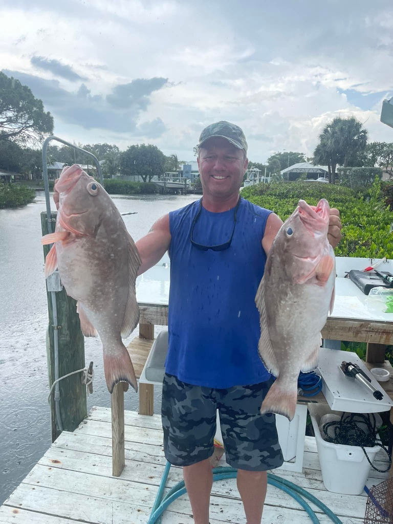 2 red grouper fish caught in FL
