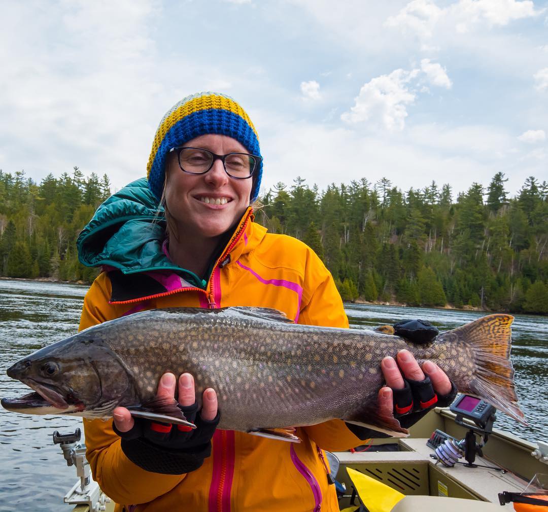 A person holding a large fish in Ontario