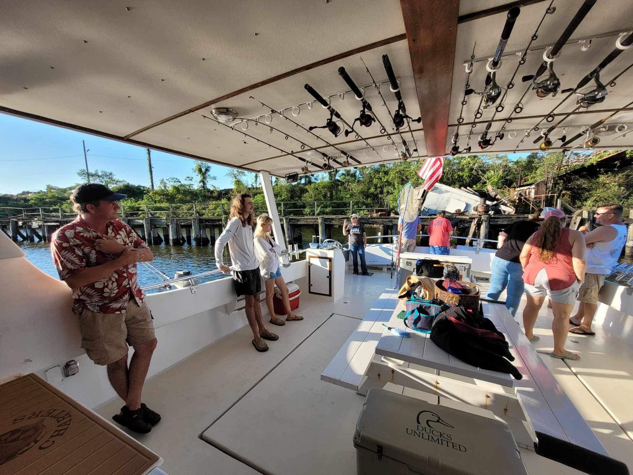 5 people enjoying fishing trip in Rock Hall