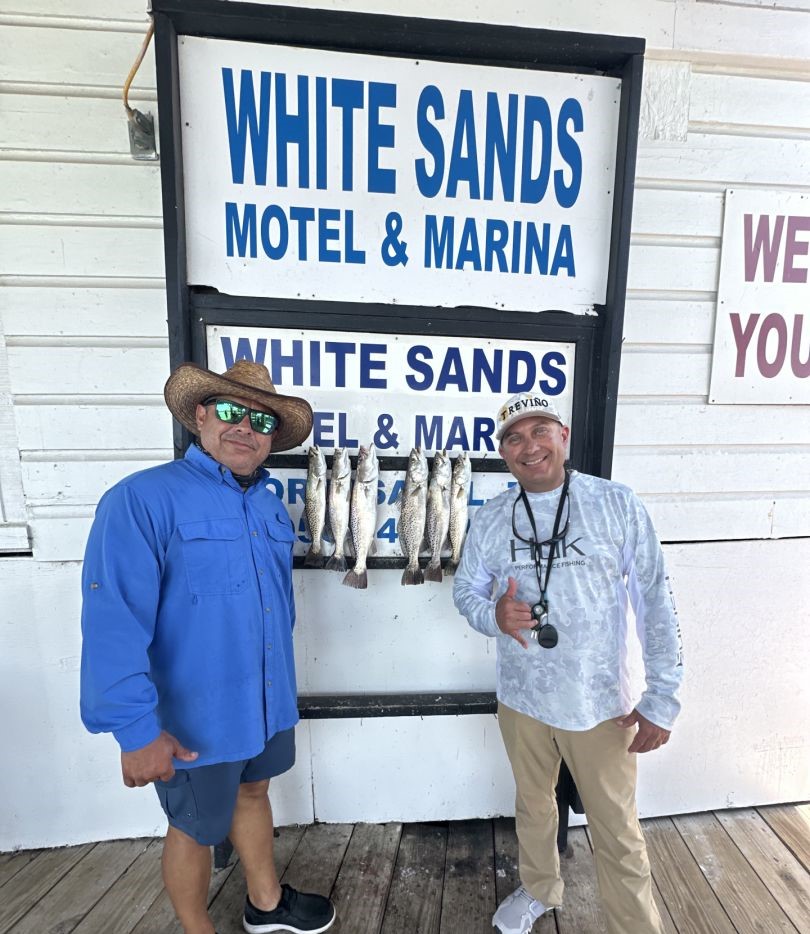 Two anglers fishing in TX